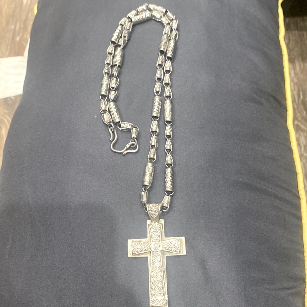Platinum 100gm 26 inches chain, with 14k white gold charm, with diamonds.! Nice.